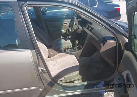 1999 Toyota Camry Le from USA, damaged, VIN 4T1BG22K5XU488052